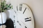 Simple White Lightly Distressed Large Wall Clock with Black Roman Numerals (in stock)